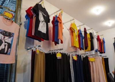 Lots of colourful t shirts and shirts available at the many stores